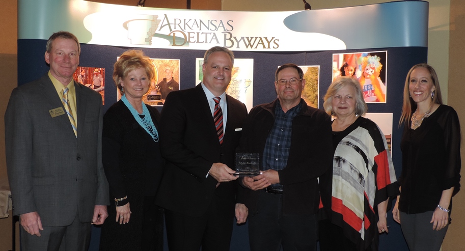 Marcel Hanzlik, tourism association president, with representatives of Historic Dyess Colony, which received the Cultural Heritage Award (from left): Paula Miles, Kirkley Thomas, Larry Sims,  Dr. Ruth A. Hawkins and Dr. Elista Istre